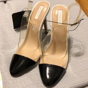 Clear and black heels